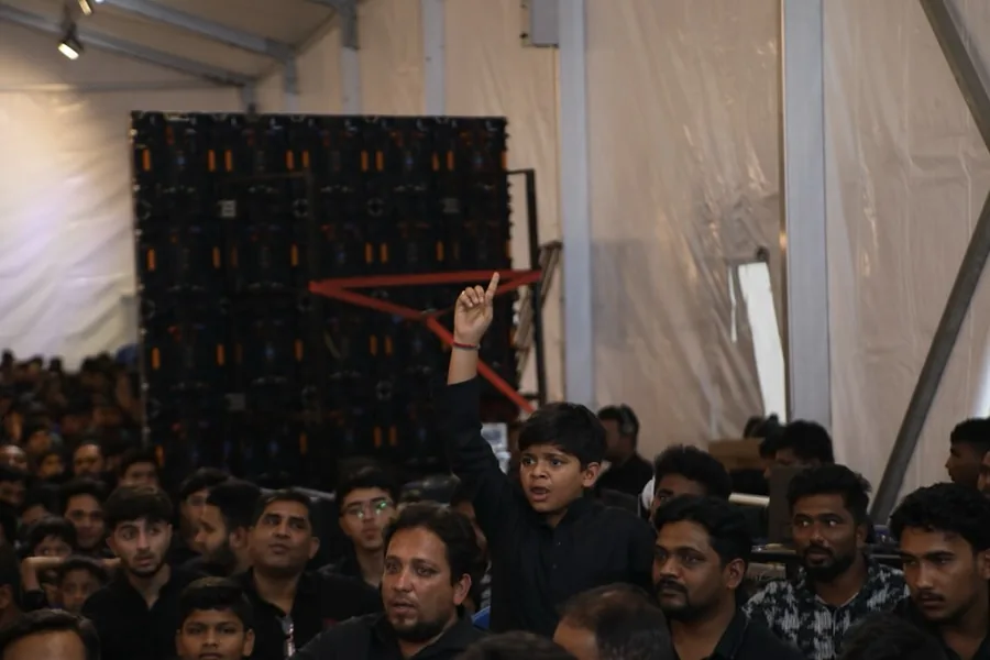 Attendees listening to the speakers